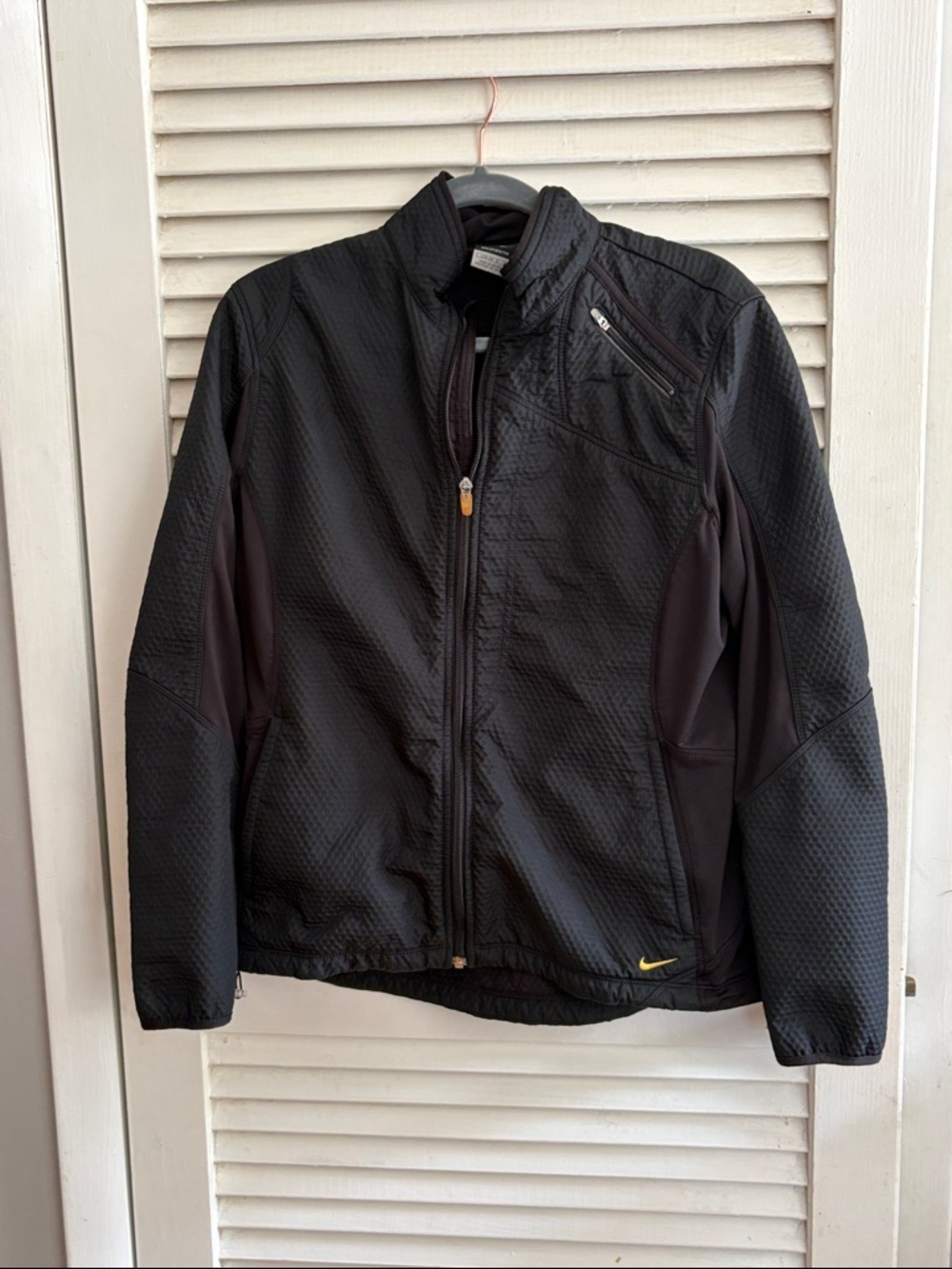 Nike Women’s Black Performance Quilted Jacket with Gold Swoosh